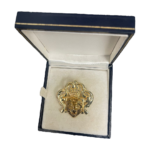 GOLDEN LION HEAD BROOCH